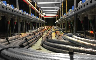 Industrial cables neatly organized in a server room or data center.